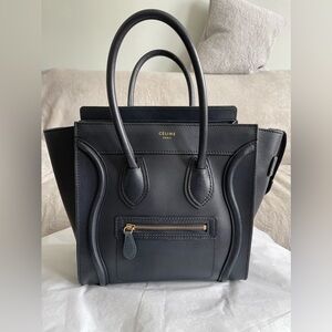 CELINE 
Drummed Calfskin Micro Luggage Navy